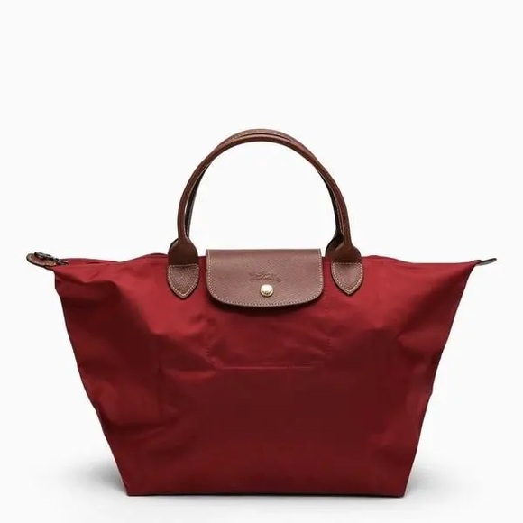Longchamp Handbags - Longchamp Le Pliage Red Short Handle Bag in MEDIUM